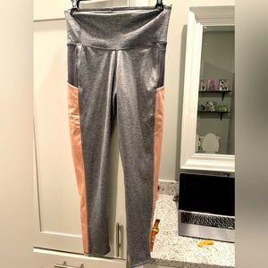 Tasc Grey and Pink leggings. Size medium.